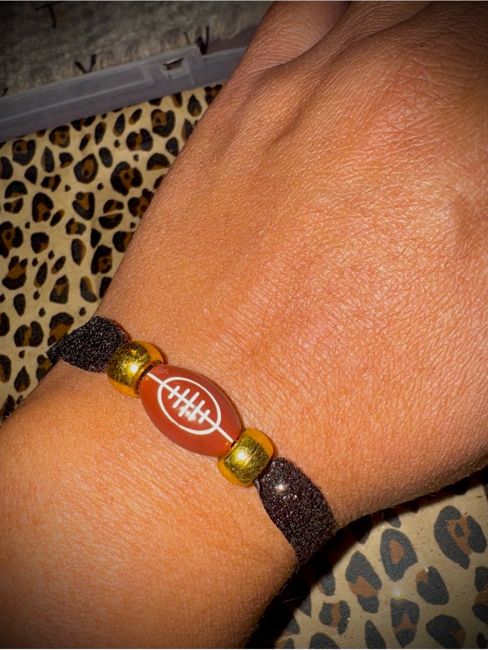 Glittery Black Football Charm Bracelet with Gold Beads